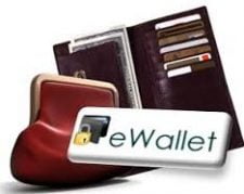 Lommebok med mange kort. En brun lommebok til. Et skilt med teksten e-Wallet